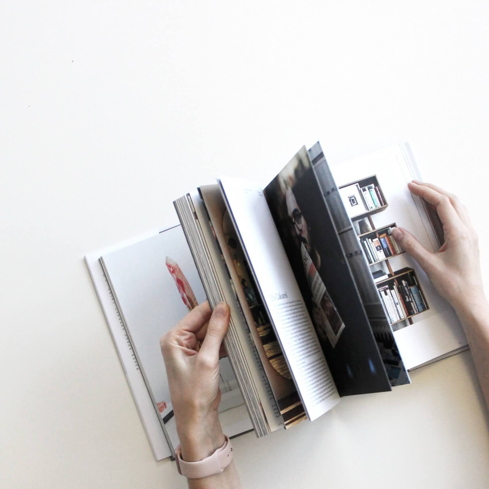 Women Flicking Through a Book